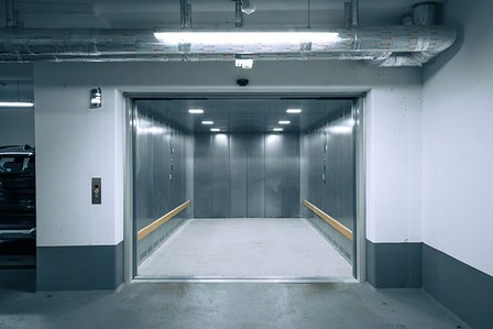 car lift with open doors 